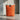 Orange climbing chalk bag with a black strap and 'H-24' label on a white background